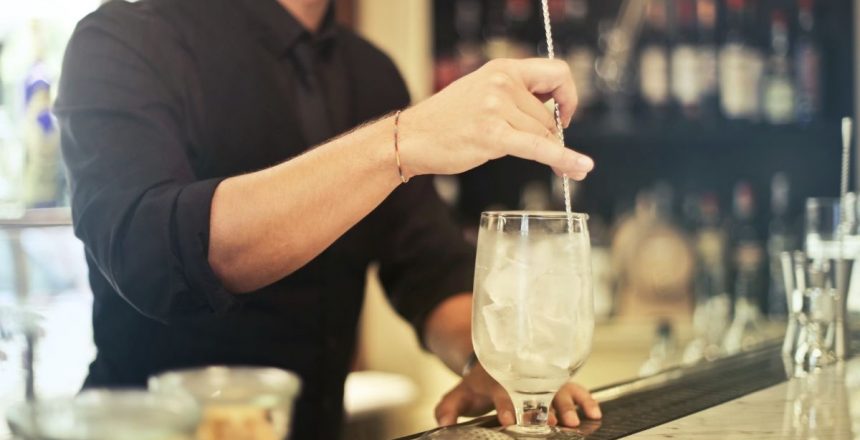 man making cocktail